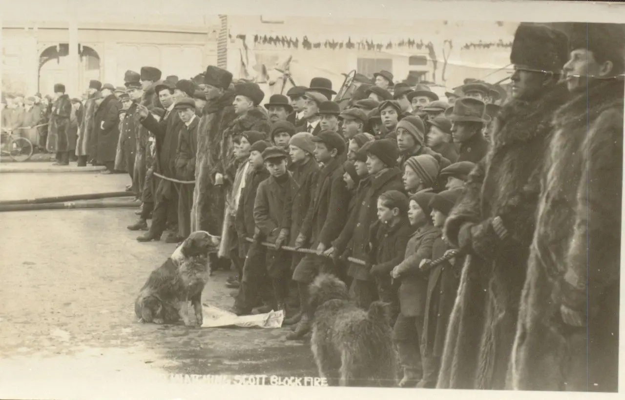 Crowd watching the Scott Block fire, about 1912